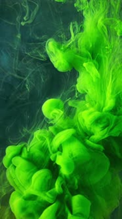 A Beautiful Mixture of Acrylic Inks in Dark Blue Glittering Water Stock Footage Close Up of Green
