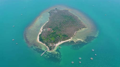 Drone view from top of beautiful tropical island with calm blue sea in Jepara, Indonesia