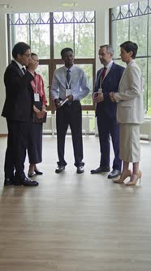 Diverse Business Team Meeting in Modern Office