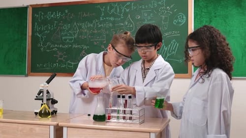 Children Doing Science Experiment in Classroom