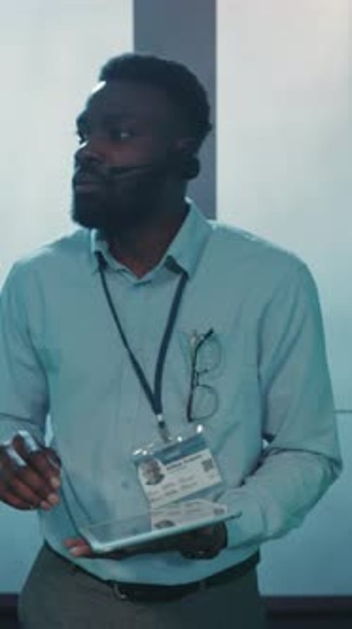 Man Using Tablet in Data Center Environment