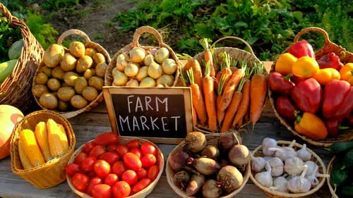 Vegetables and Fruits Against the Background of a Farmers Market Selective Focus Food