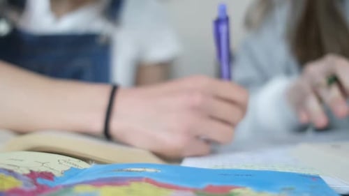 Students Studying Together at Home