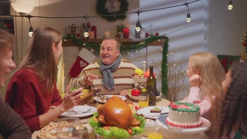 Family Enjoying Christmas Dinner at Home