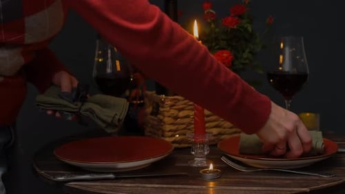 Woman Setting Table for St Valentines Day Celebration