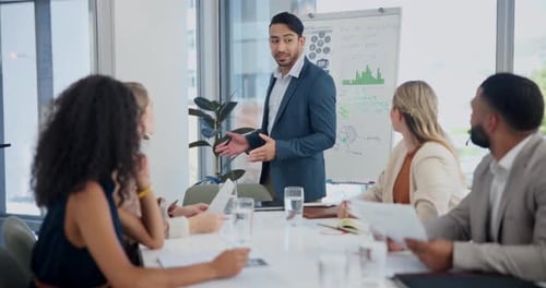 Meeting, presentation and man with business people and statistics, graph