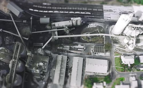 4k video footage of the aerial view of an industrial area during the day
