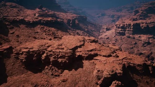 Crimson Majesty Overlooking a Majestic Red Stone Canyon From a Mountain Summit