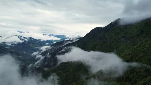 Green Mountains Filled with Mist Aerial Shot