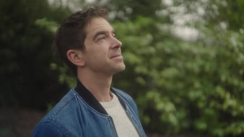 Man looking at tree