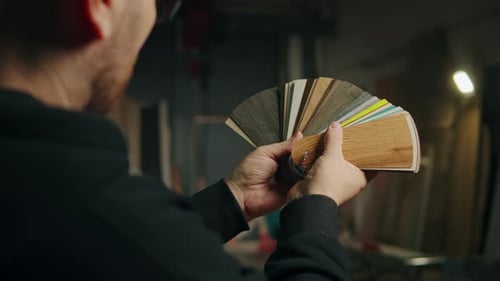 Portrait of Carpenter Man Choosing Color Palette Wood Worker on Furniture Factory Builder Wearing
