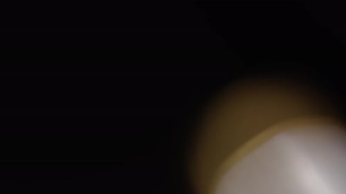Abstract Light Flares on Dark Background