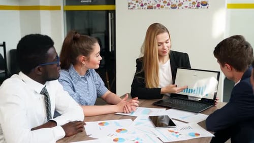 Collaborative Business Meeting with Data Presentation