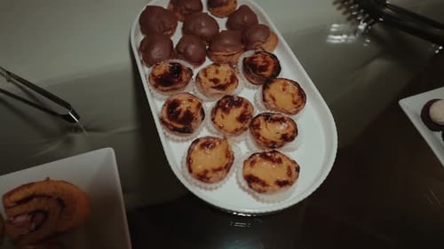 Delicious Pastries on Display on a White Table