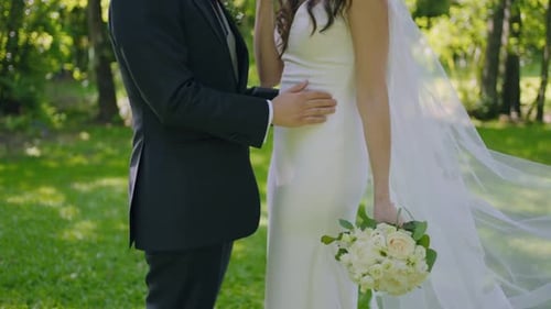 Romantic Wedding Day Embrace in Sunny Park