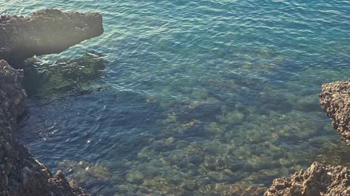 Light Blue Clear Water in the Lagoon Water on the Rocks