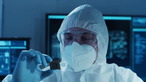 Microelectronics Engineer Works in a Modern Scientific Laboratory on Computing Systems Electronic