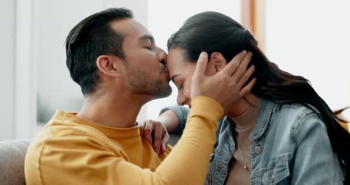 Loving Couple Shares Tender Moment at Home