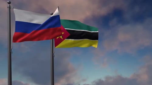 Waving Flags of Russia and Mozambique on a Cloudy Sky