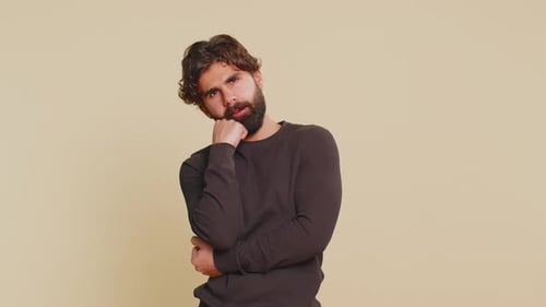 Man Thinking and Posing with Hand on Chin