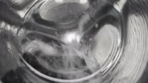 Clothes Tumble in a Modern Washing Machine