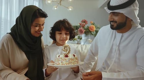 Happy Family Celebrating a Child's Birthday