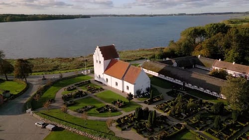 Aerial of seaside church on a sunny day