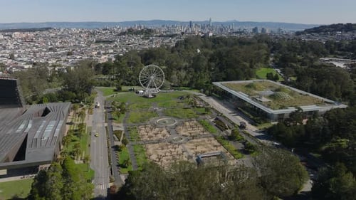 Forwards Fly Above Golden Gate Park Monuments and Museum Buildings Surrounded By Green Grass and