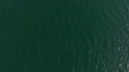 Saltmills, County Wexford, Ireland, September 2024. Drone in Bird's Eye view pushes above the turquo