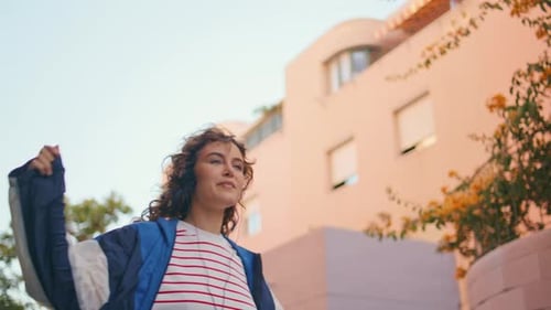 Dancing Woman Listening Song in Earphones at Summer Street Closeup Girl Walking