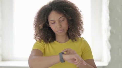 Woman Interacting with Smart Watch Device Close Up