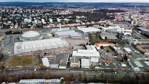 Aerial view of the exhibition complex. The main building and the surrounding city.