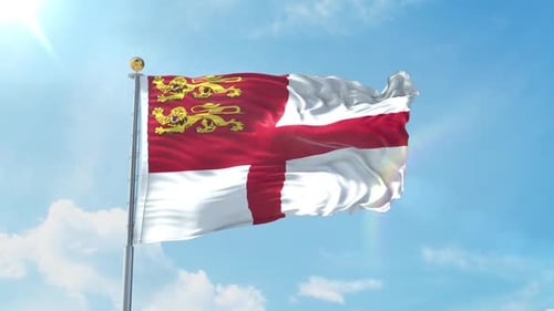 Realistic Guernsey Flag Waving in Blue Sky