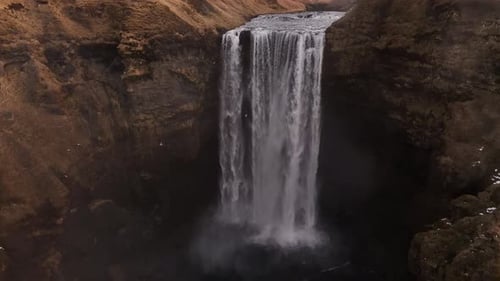 Skógafoss Waterfall at Skógar in Iceland, stunning scenery with mist and cascading water