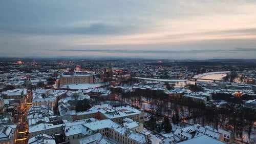 Winter view of Krakow with Wawel Royal Castle covered in snow