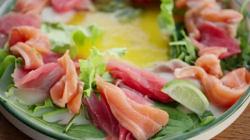Colorful Plate of Fresh Sashimi on Arugula