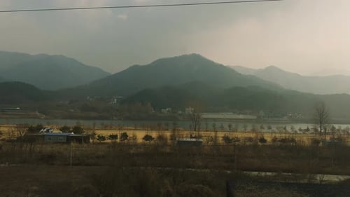Seoul Mountains at Sunset From the Train