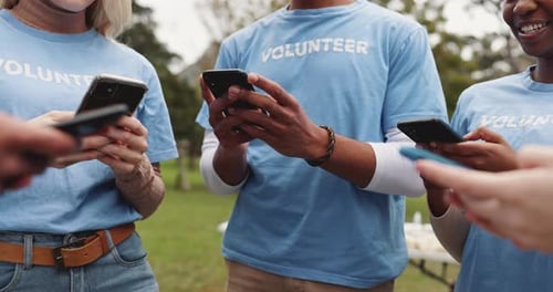 Phone, volunteer and group of people in park for solidarity, support or online chat for social