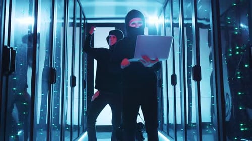 Tech Intruders Operating Covertly in a Data Center Analyzing a Cyber Crime Scene