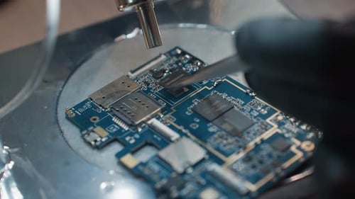 Circuit Board Repair With Heat Gun and Tweezers