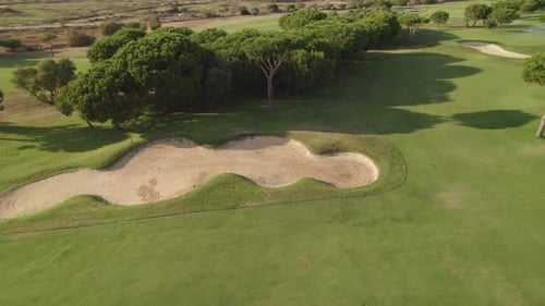 Golf course. Panoramic aerial view of golf course fairway and bunker. Spain.