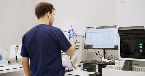 Man Working in Clinic Laboratory