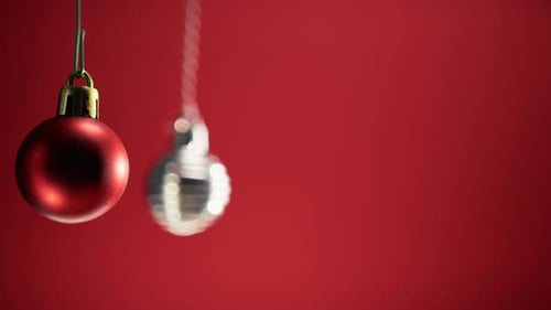 Christmas Ornaments Against Red Background