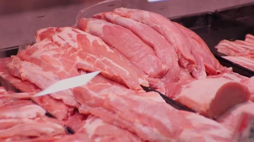 Juicy uncooked organic pork meat close up for barbecue.