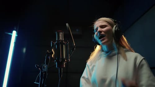 Modern Sound Studio for Recording Music Portrait of Singing Woman Singer Record of Soundtrack