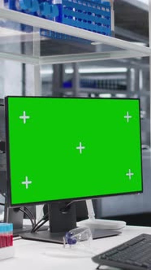 Green Screen Computer Monitor in a Modern Laboratory