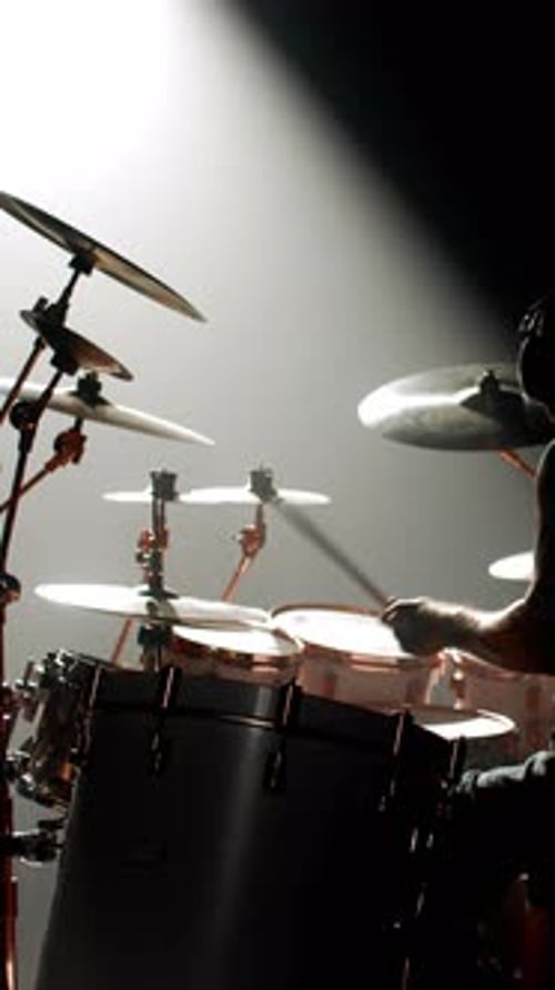 Enjoy Power of Rock Music and Listening to Rhythm of Drums Professional Male Rock Drummer Playing