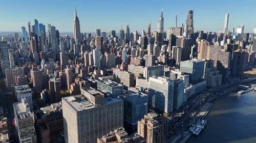 Aerial video above skyscrapers and skyline in Manhattan, New York