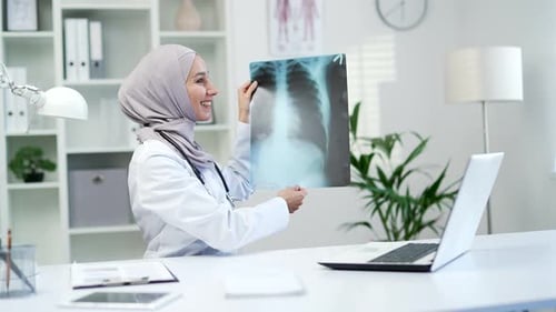 Doctor Explains X-Ray During Telemedicine Appointment