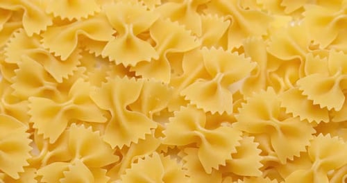 Pasta Backgroud Macro View of Dry Authentic Italian Farfalle